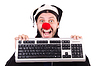 Payaso divertido con el teclado | Foto de stock