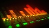 Colorful audio equalizer bars in neon lights on | Stock Illustration