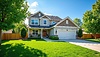 Beautiful suburban house with landscaped lawn, | Stock Illustration