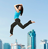 Photo 300 DPI: sporty woman jumping in sportswear