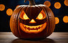 Photo 300 DPI: glowing halloween pumpkins on bokeh background, close u