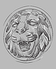 Grey stone head of lion