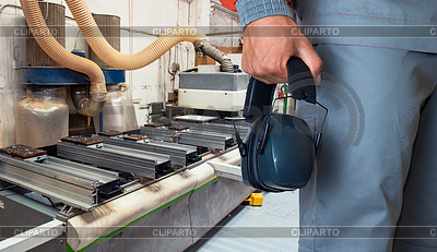 Worker with headphones | High resolution stock photo |ID 7051920