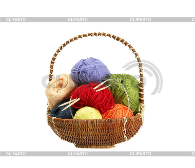 Colorful yarn balls in basket isolated on white | High resolution stock photo |ID 4322255