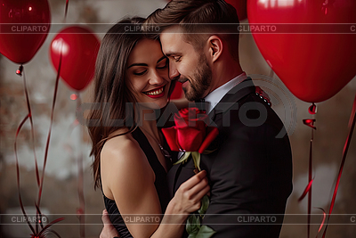 Happy couple holding red roses surrounded by | High resolution stock photo |ID 7633441