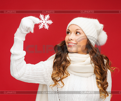 Woman with big snowflake | High resolution stock photo |ID 4438386