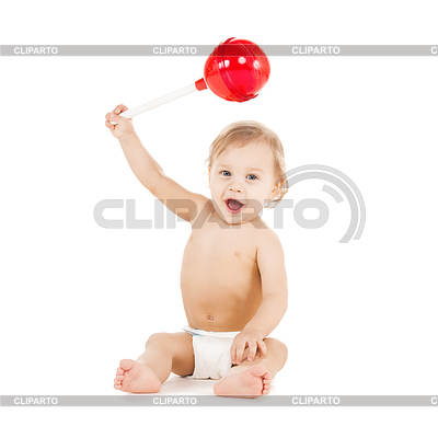 Lindo niño jugando con el lollipop grande | Foto de alta resolución |ID 4441034