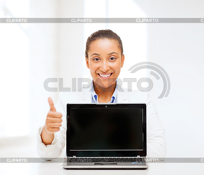 Lächelnde Frau mit Laptop-Computer | Foto mit hoher Auflösung |ID 4441886