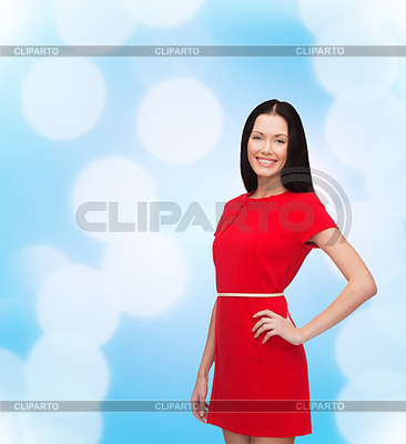 Smiling young woman in red dress | High resolution stock photo |ID 4443684