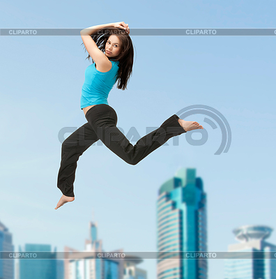 Sporty woman jumping in sportswear | High resolution stock photo |ID 4448963