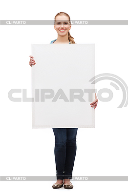 Smiling young woman with white blank board | High resolution stock photo |ID 4449695