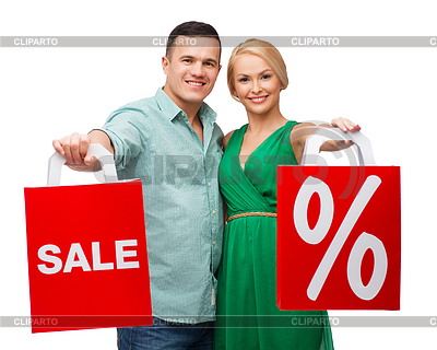 Pareja sonriente con bolsas de la compra | Foto de alta resolución |ID 4451577