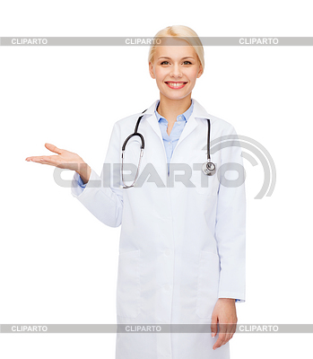 Sonriente mujer médico sosteniendo algo en la mano | Foto de alta resolución |ID 4459036