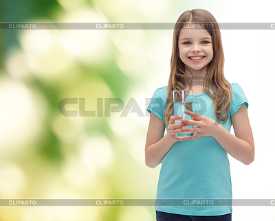 Smiling little girl with glass of water | High resolution stock photo |ID 4464815