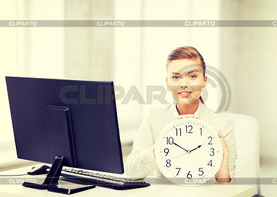 Attractive businesswoman with white clock | High resolution stock photo |ID 4466653