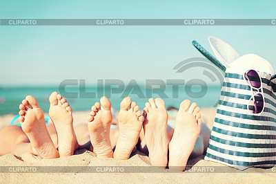 Three women lying on beach | High resolution stock photo |ID 4472064