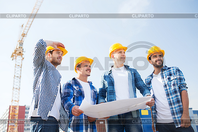 Grupo de constructores con tablet pc y el modelo | Foto de alta resolución |ID 4706872