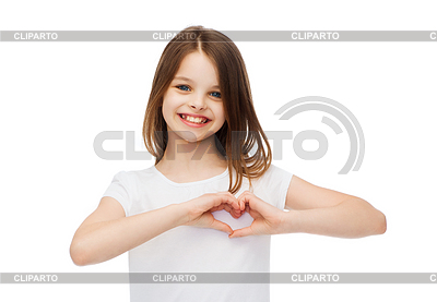 Smiling little girl showing heart with hands | High resolution stock photo |ID 4915067