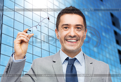 Happy smiling businessman in eyeglasses and suit | High resolution stock photo |ID 4915197