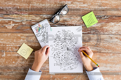 Hands drawing schemes on paper sheets | High resolution stock photo |ID 4933976